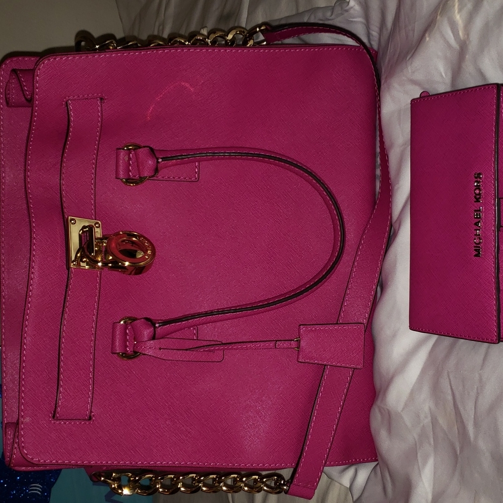 Authentic used pink Michael Kors purse set